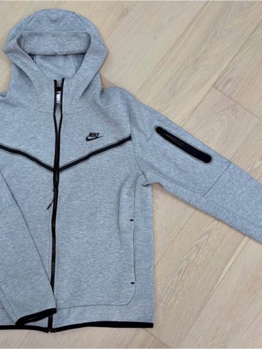 Grey Nike Tech Zipper Hoodie.
